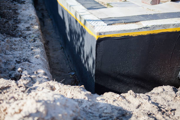 Professional Waterproofing technician working in New Waverly, IN